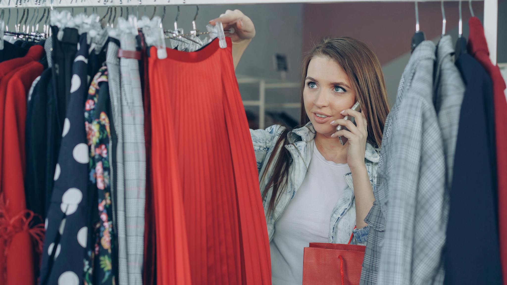 Young Woman Shopping In A Store Holding